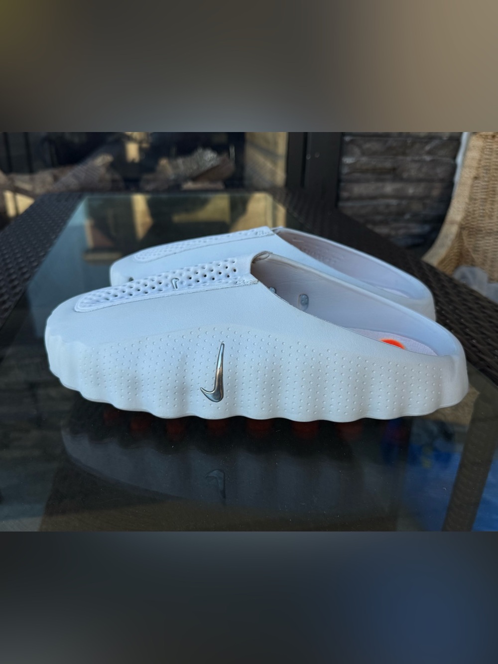 Nike White Men's Slip-On Foam Sandals with Silver Swoosh and Orange Accents